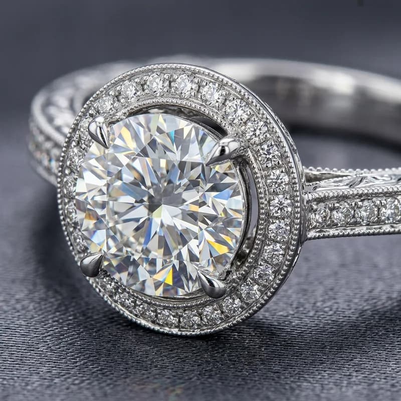 Macro close-up of diamond halo engagement ring with edge-to-edge sharpness from focus stacking